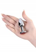 Silver anal plug with red gem